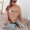 buzo algodón frisado de emojis beige