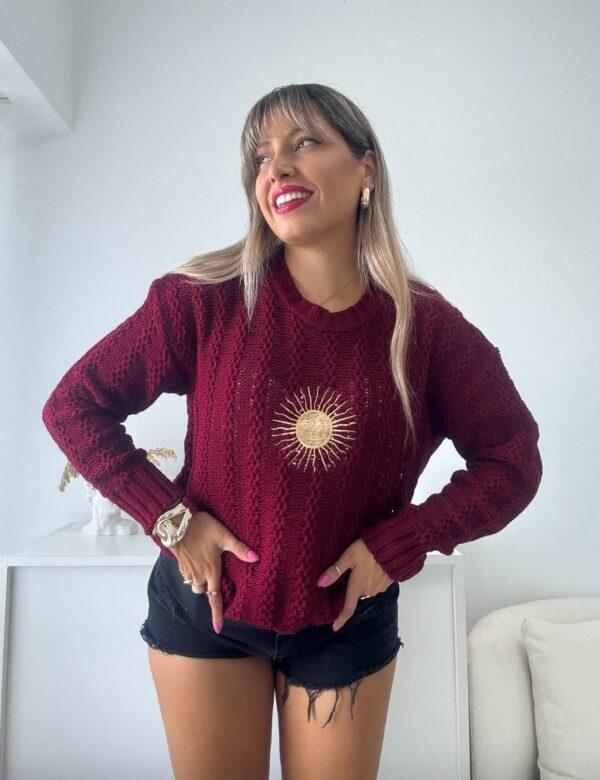 sweater trenza con sol